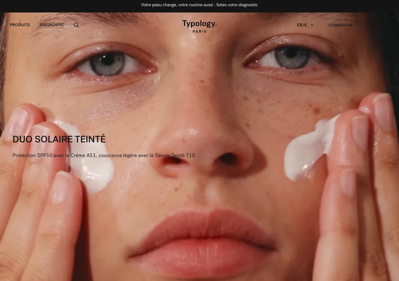 Page d'accueil de la boutique en ligne Typology : visuel plein écran minimaliste centré sur le soin