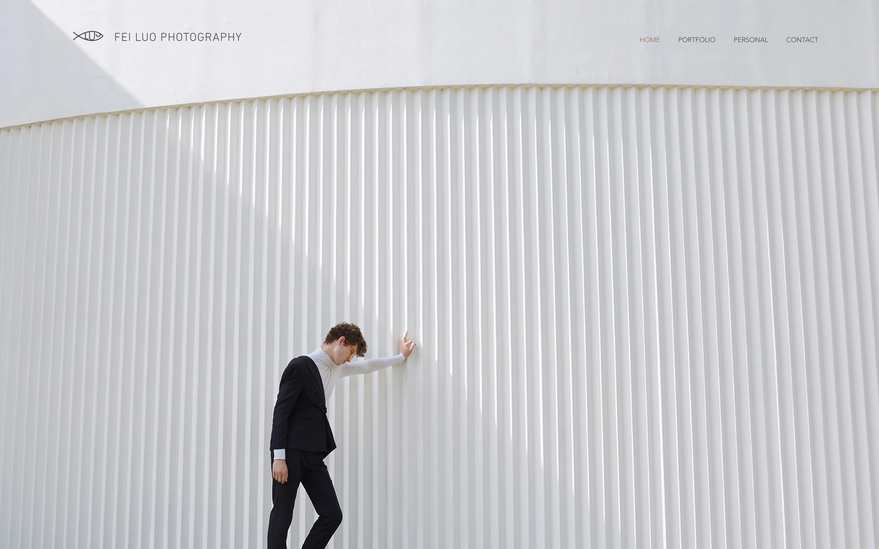 Site épuré du photographe Fei Luo réalisé avec Wix.
