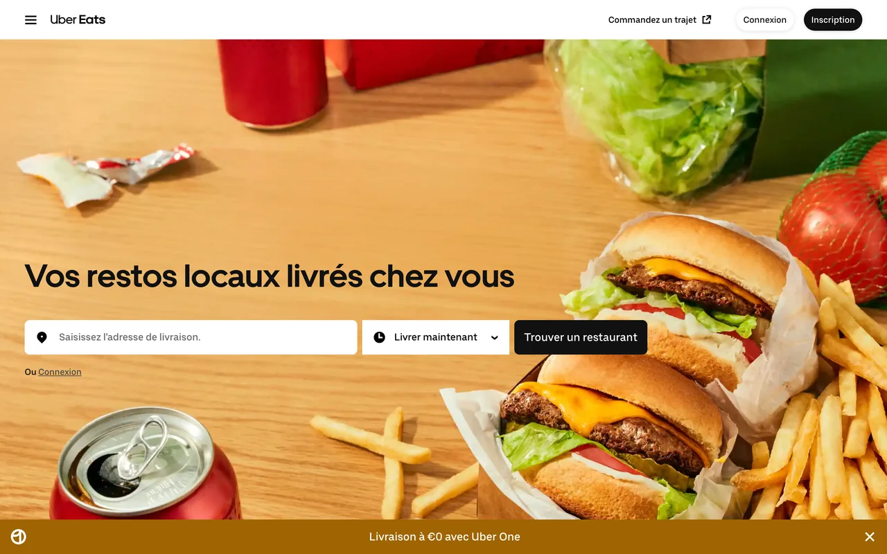 Bannière Uber Eats « Vos restos locaux livrés chez vous » avec champ d'adresse et bandeau livraison à 0 € avec Uber One